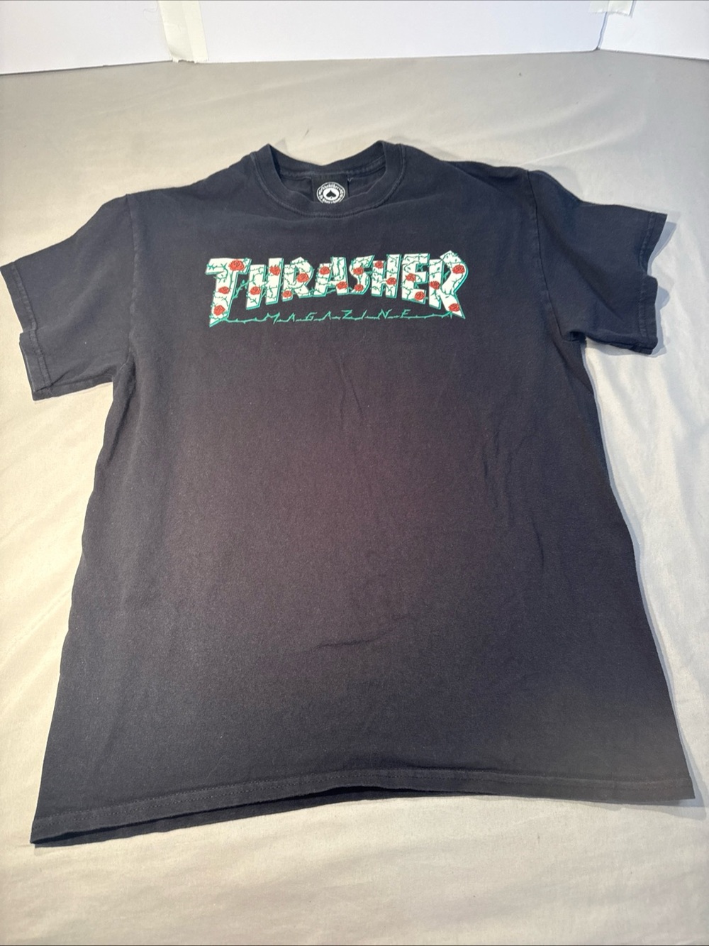 Thrasher Black Tee with Floral Green & Red Logo
